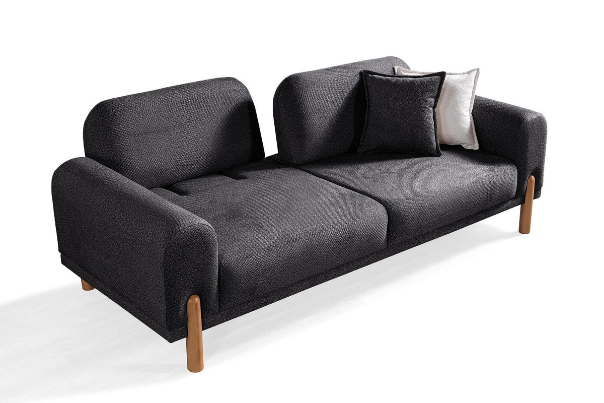 Anthrazitfarbenes 3-Sitzer Schlafsofa Class Bohem von Hanah Home mit Bouclé-Bezug, Holzbeinen und verstellbaren Armlehnen.