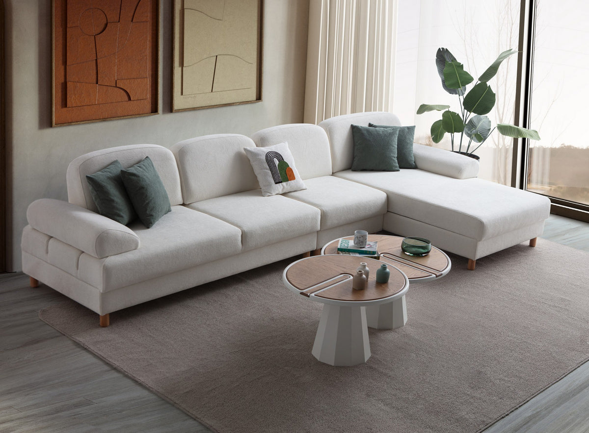 Weisses Eck-Schlafsofa Aries Relax Joker mit Coco-Boucle-Stoff, Holzbeinen und integrierter Aufbewahrungstruhe, rechte Ausführung, Ansicht von vorne.