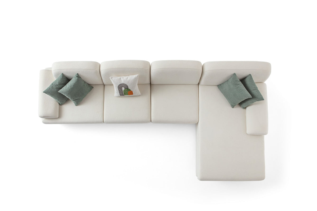 Weisses Eck-Schlafsofa Aries Relax Joker mit Coco-Boucle-Stoff, Holzbeinen und integrierter Aufbewahrungstruhe, rechte Ausführung, Ansicht von vorne.