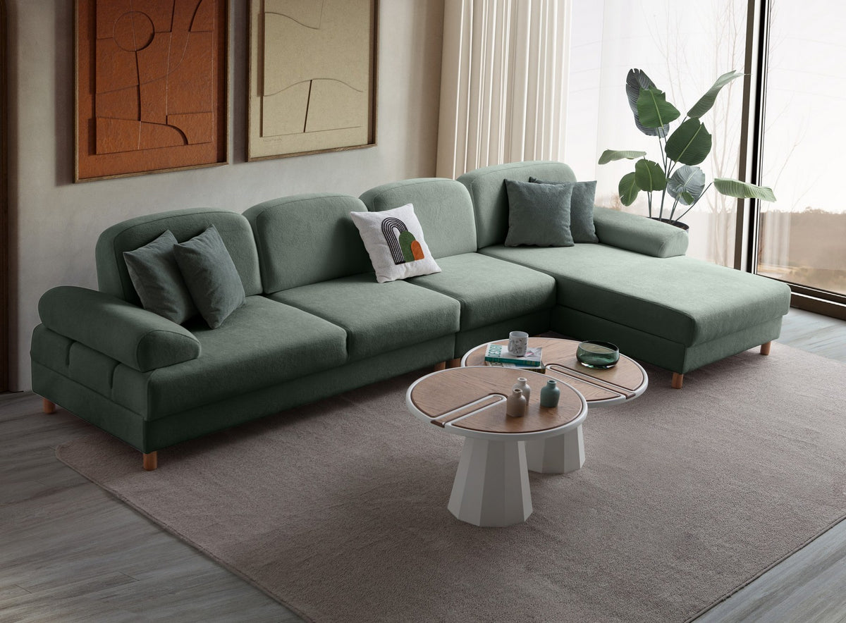 Grünes Eck-Schlafsofa Aries Relax Joker mit Coco-Boucle-Stoff, Holzbeinen und ausziehbarer Liegefläche, rechtsseitig positioniert.