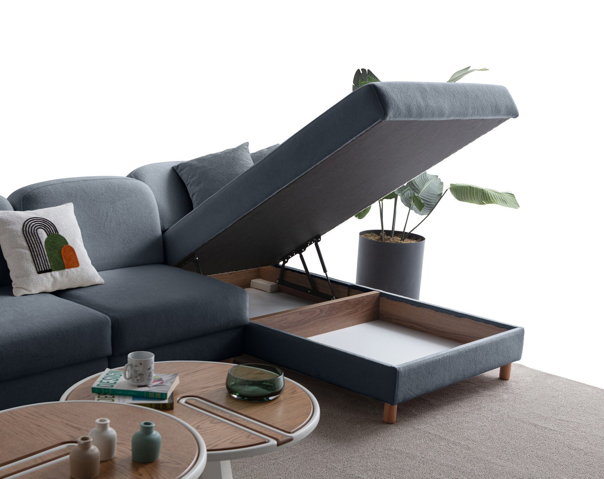 Eck-Schlafsofa Aries in Marineblau mit Coco-Boucle-Stoffbezug, Holzbeinen und Kissen, rechte Ausführung, Sitz- und Liegefläche sichtbar.