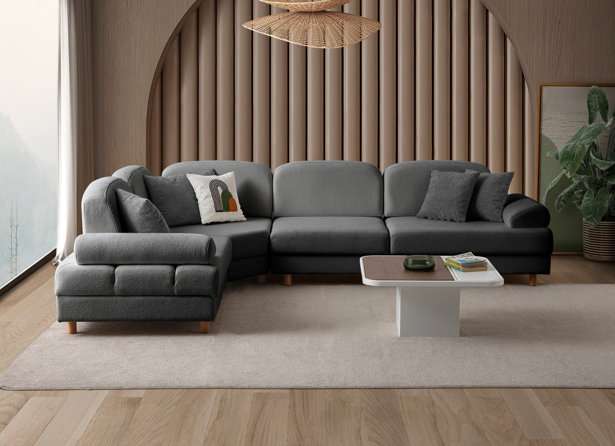 Anthrazitfarbenes Eck-Schlafsofa mit Boucle-Stoffbezug, Holzbeinen und Aufbewahrungstruhe, fotografiert in modularer L-Form.