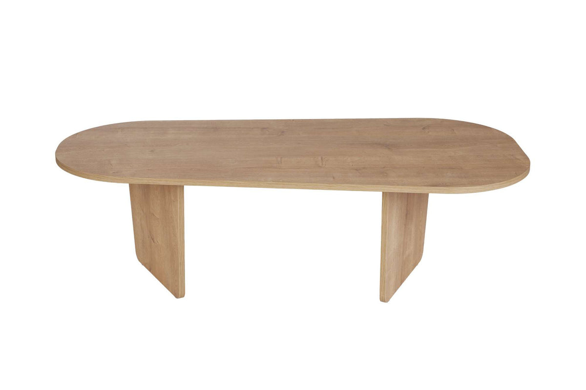 Couchtisch Ovalis von Nordure in Eiche-Optik, Tischplatte aus melaminbeschichteter Spanplatte, Masse 130x65x40 cm, freistehend im Raum.