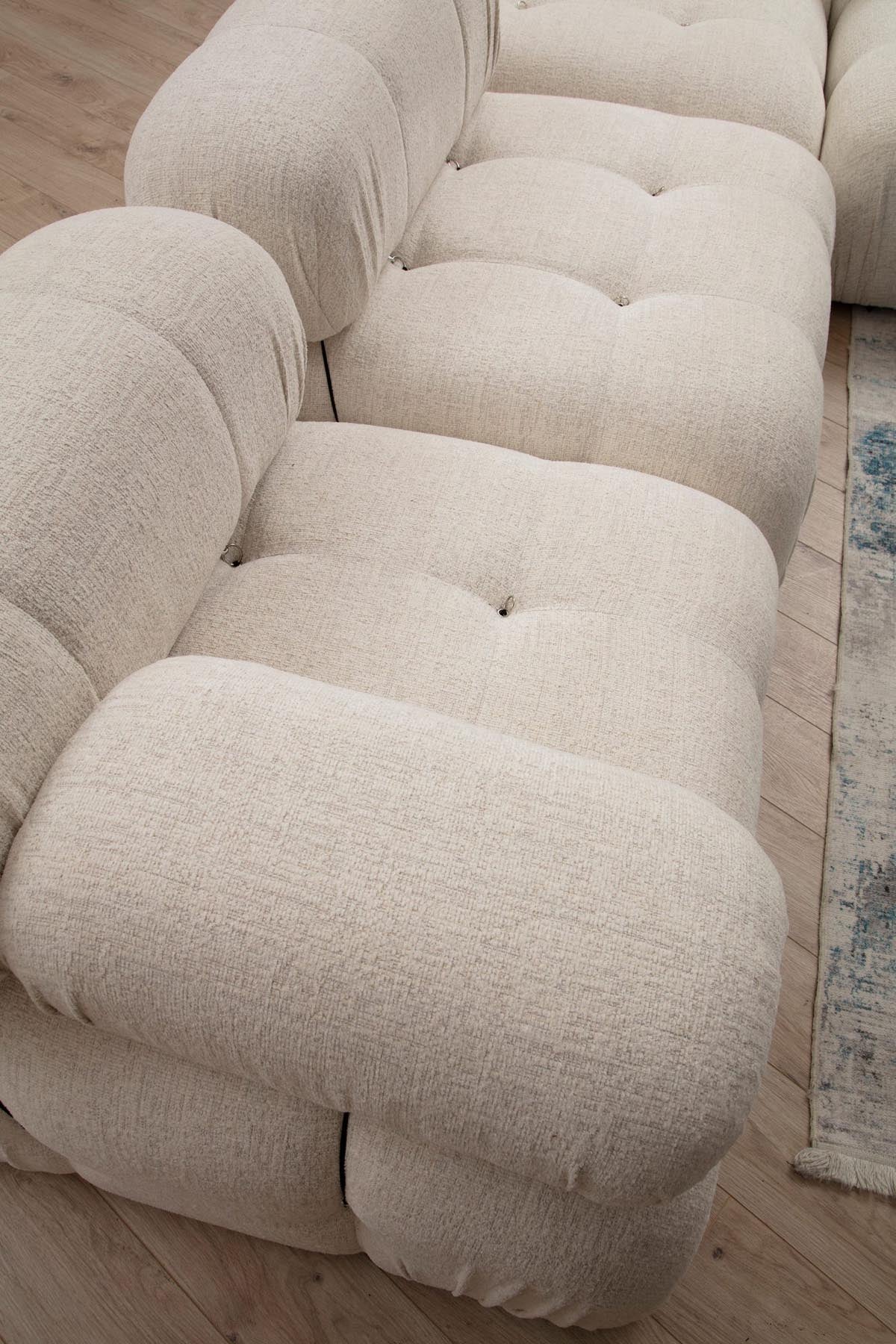 Bubble Cream Bouclette L1-O1-1R-PUF in Sahne präsentiert im Onlineshop von KAQTU Design AG. Ecksofa ist von Atelier Del Sofa