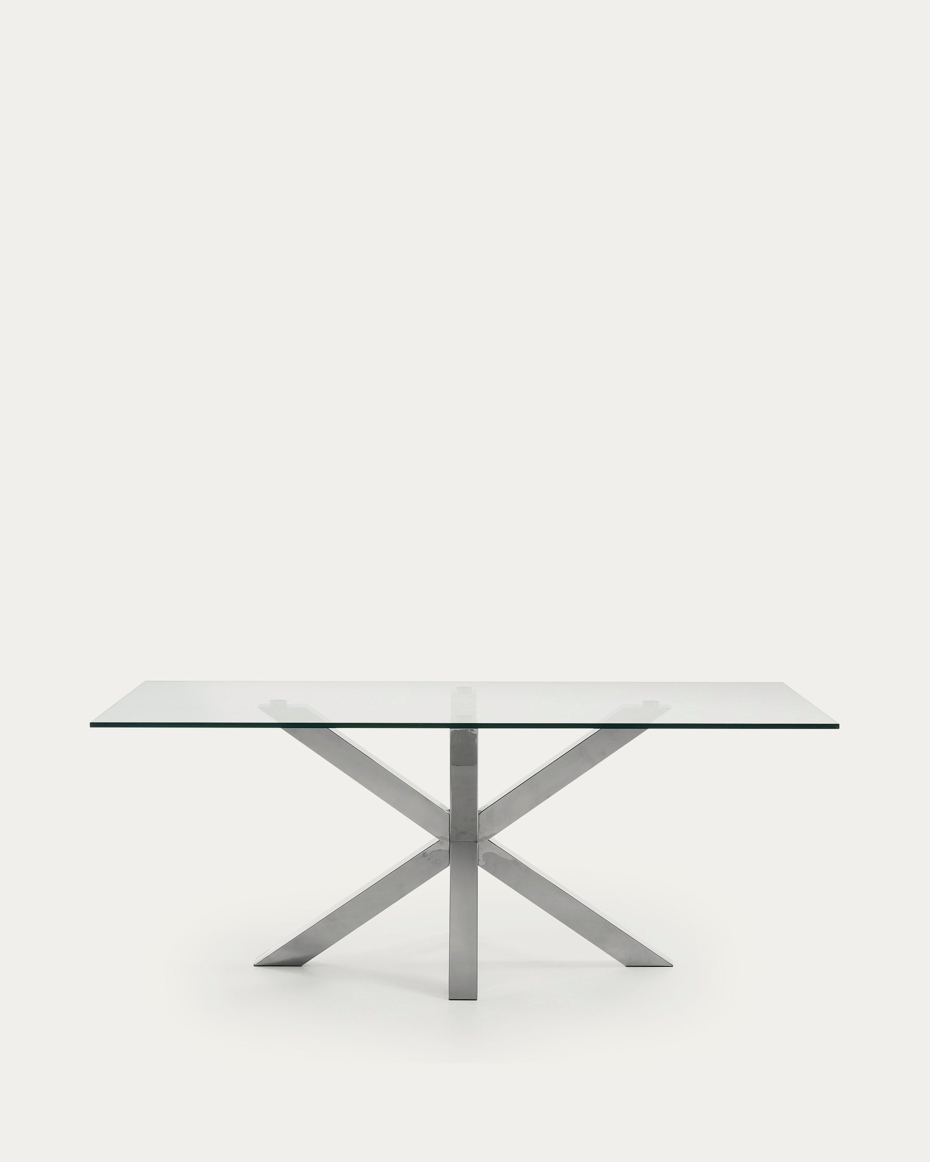 Moderner Argo Tisch mit klarer Glasplatte und robusten Edelstahlbeinen, 200x100 cm, von Kave Home. Perfekt für zeitgemässe Räume.