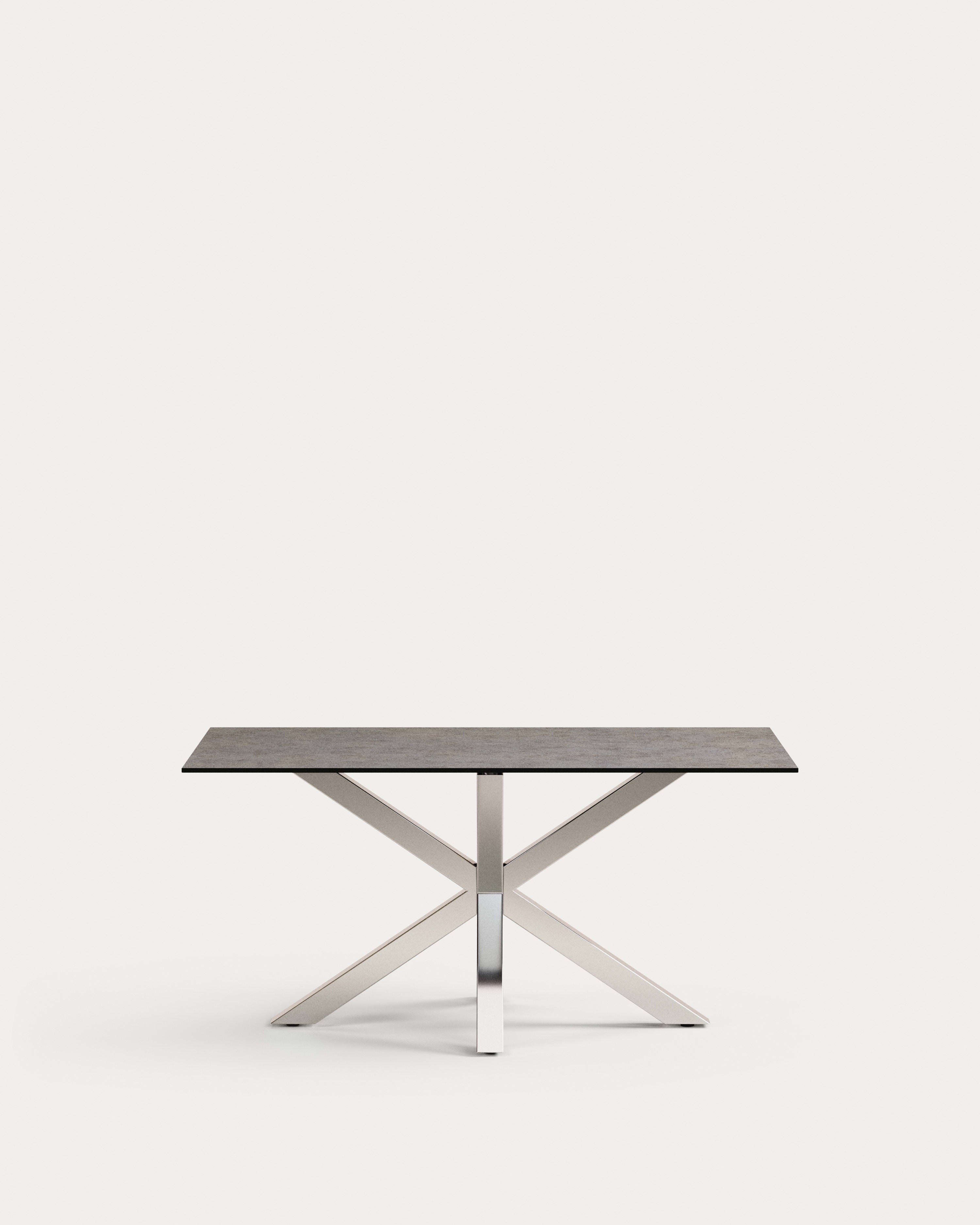 Eleganter Tisch Argo mit Iron Moss-Porzellanplatte und Edelstahlbeinen, 160x90 cm, perfekt für moderne Wohnräume.