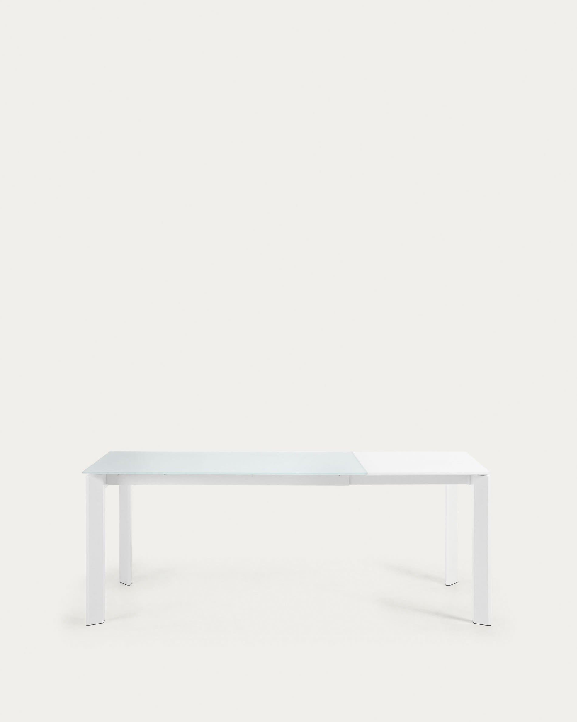 Eleganter Axis Ausziehtisch mit weisser Glasplatte und Stahlbeinen, ausziehbar von 140 auf 200 cm, perfekt für moderne Wohnräume.