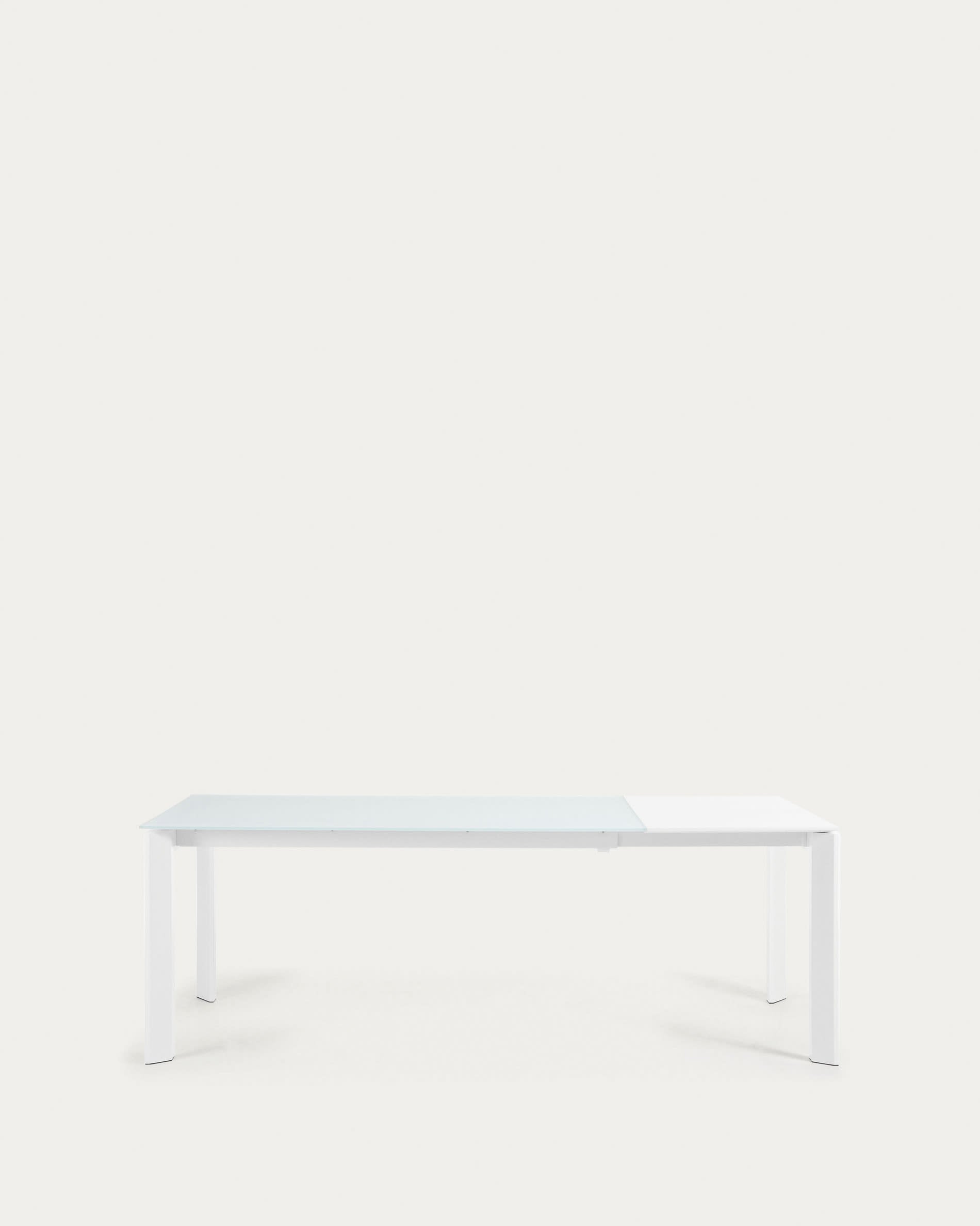 Eleganter Axis Ausziehtisch mit weißer Glasplatte und Stahlbeinen, perfekt für moderne Esszimmer, ausziehbar von 160 bis 220 cm.