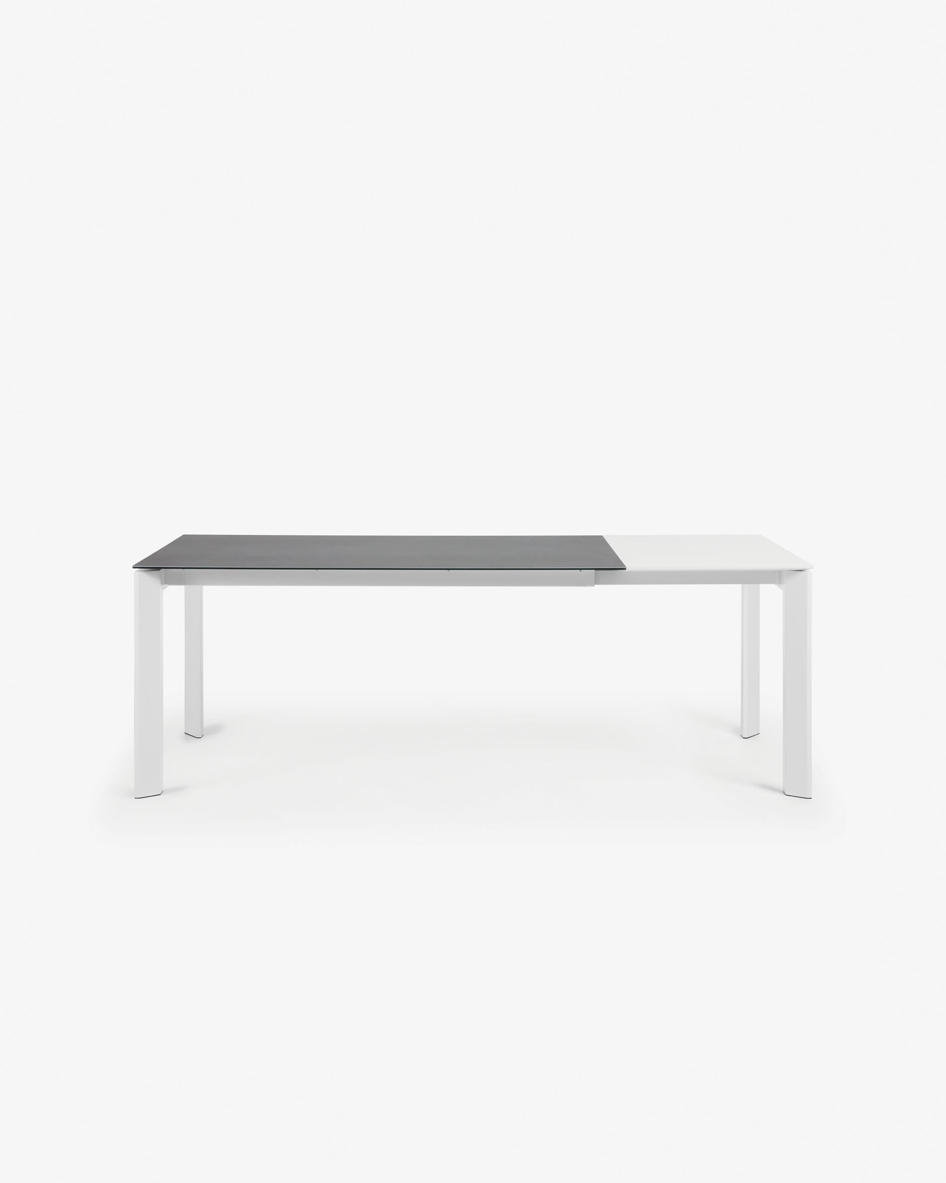 Eleganter Ausziehtisch mit Vulcano Roca Feinsteinzeugplatte und weißen Beinen, 160-220 cm, ideal für modernes Wohnen.