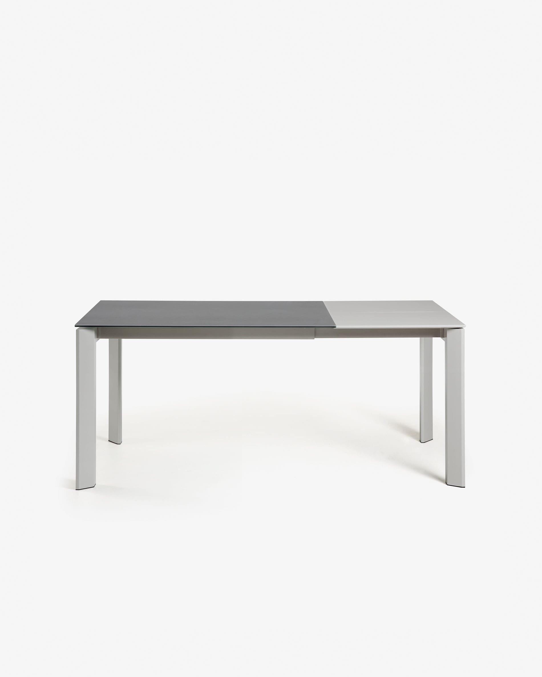 Moderner Ausziehtisch mit grauen Beinen und Feinsteinzeugplatte im Vulcano Roca Design, erweiterbar von 120 auf 180 cm.