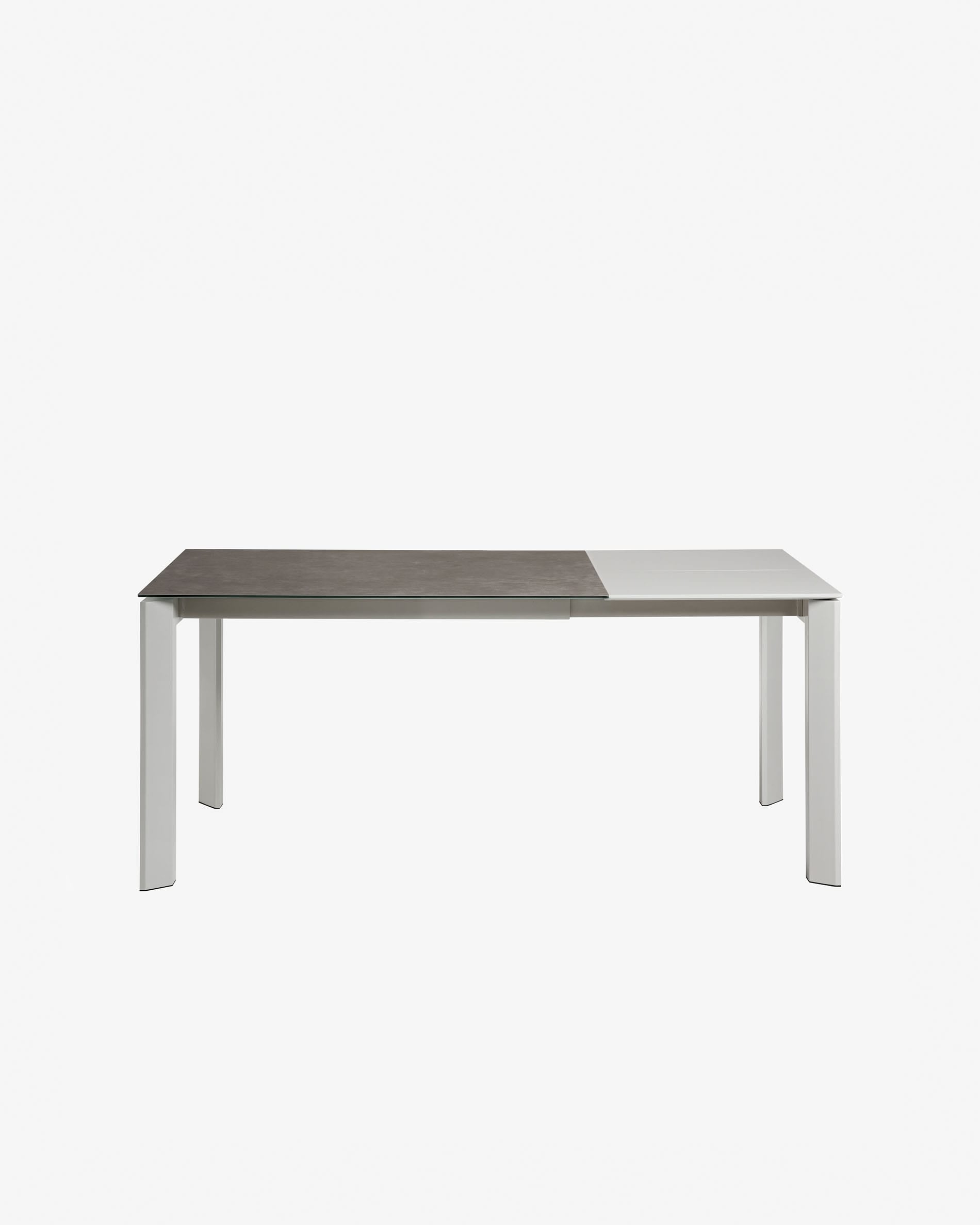Eleganter Ausziehtisch mit grauer Feinsteinzeugplatte und robusten Stahlbeinen, perfekt für moderne Esszimmer.