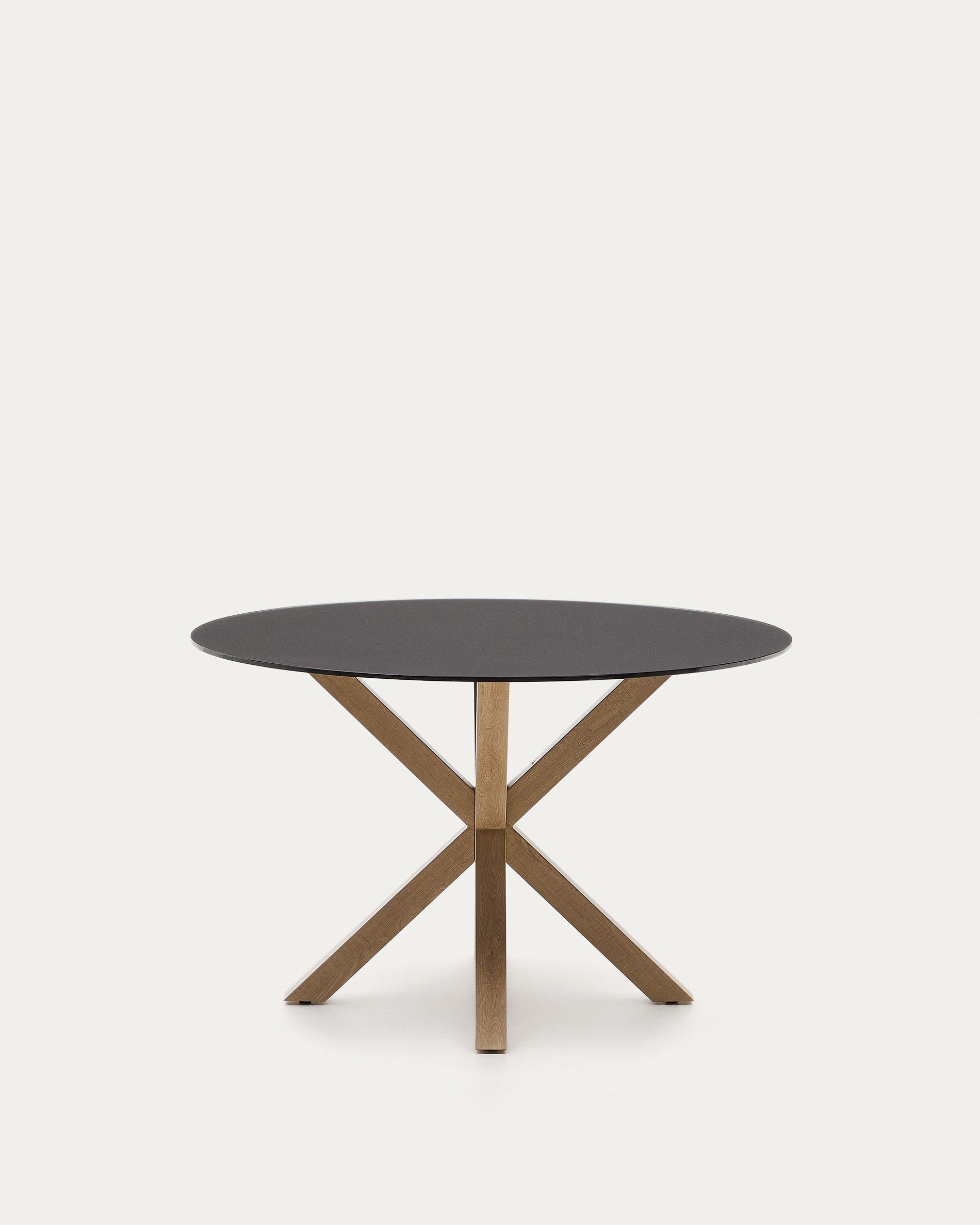 Eleganter Tisch Argo mit robuster schwarzer Milchglasplatte und stabilen Stahlbeinen in Holzoptik, Ø 120 cm – ideal für stilvolle Essbereiche.