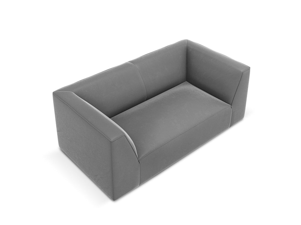 Zweisitzer-Sofa Siena in Beige-Salvador-Samt mit schwarzen Kunststoffbeinen, gepolsterter Sitzfläche und niedriger Rückenlehne, Frontansicht.