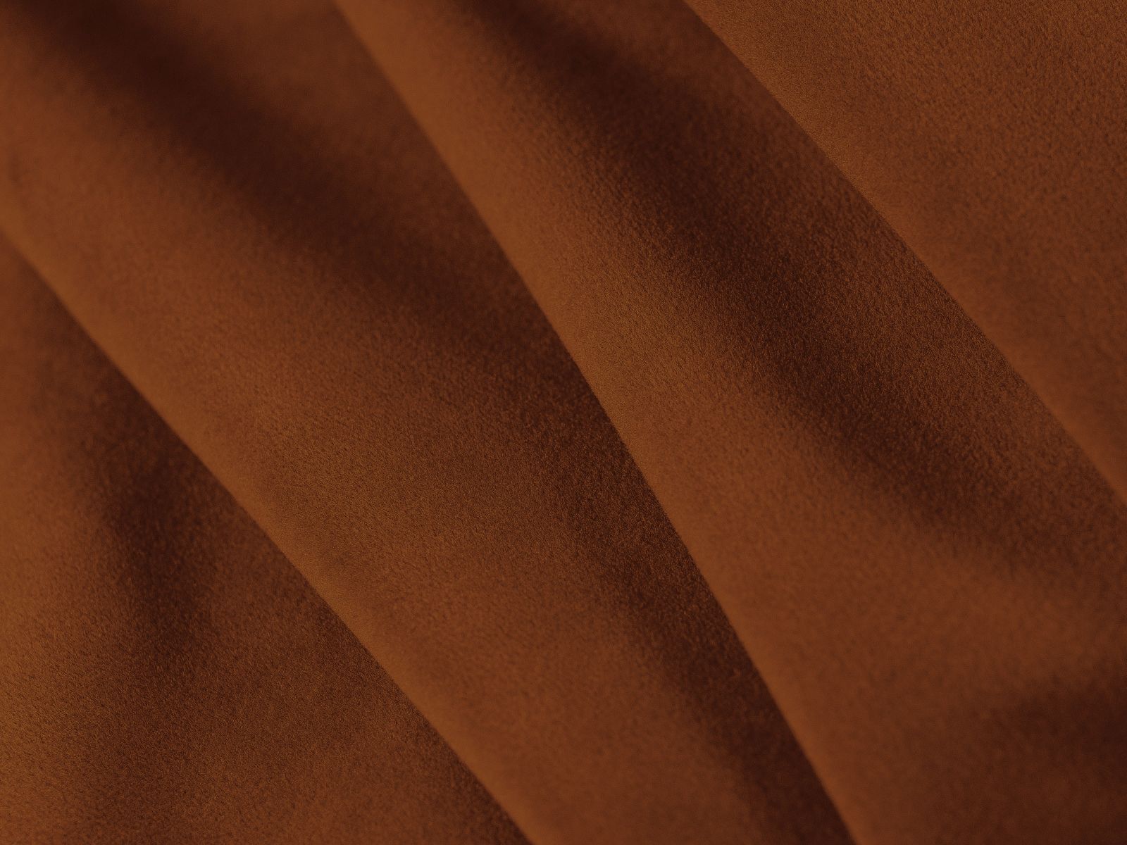 Modernes 3-Sitzer Sofa Grena in warmem Terracotta, ideal für gemütliche Abende und als praktisches Bettsofa für Übernachtungsgäste.
