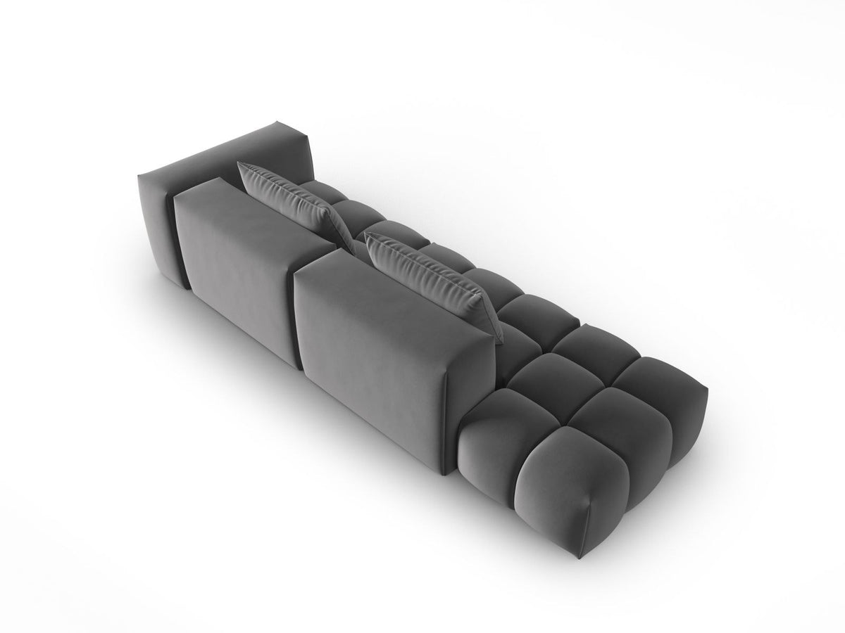 Modulares 4er Sofa Verona mit sandfarbenem Casino-Samtbezug, schwarzen Kunststoffbeinen und geradliniger Rückenlehne, Ansicht von links.