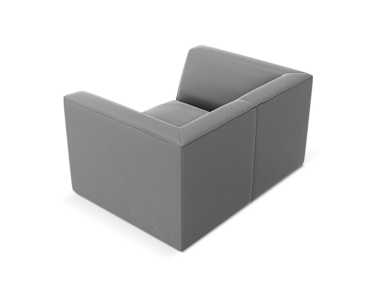 Beiger Samt-Sessel Siena von Cosmopolitan Design mit Massivholzrahmen, gepolsterter Sitzfläche und schwarzen Kunststoffbeinen.
