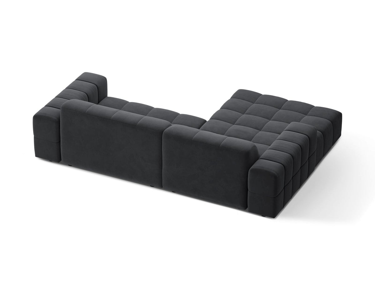 Ecksofa links Chicago in dunkelgrünem Samtstoff mit schwarzen Kunststoffbeinen, Massivholzrahmen und markanter Récamiere-Form.