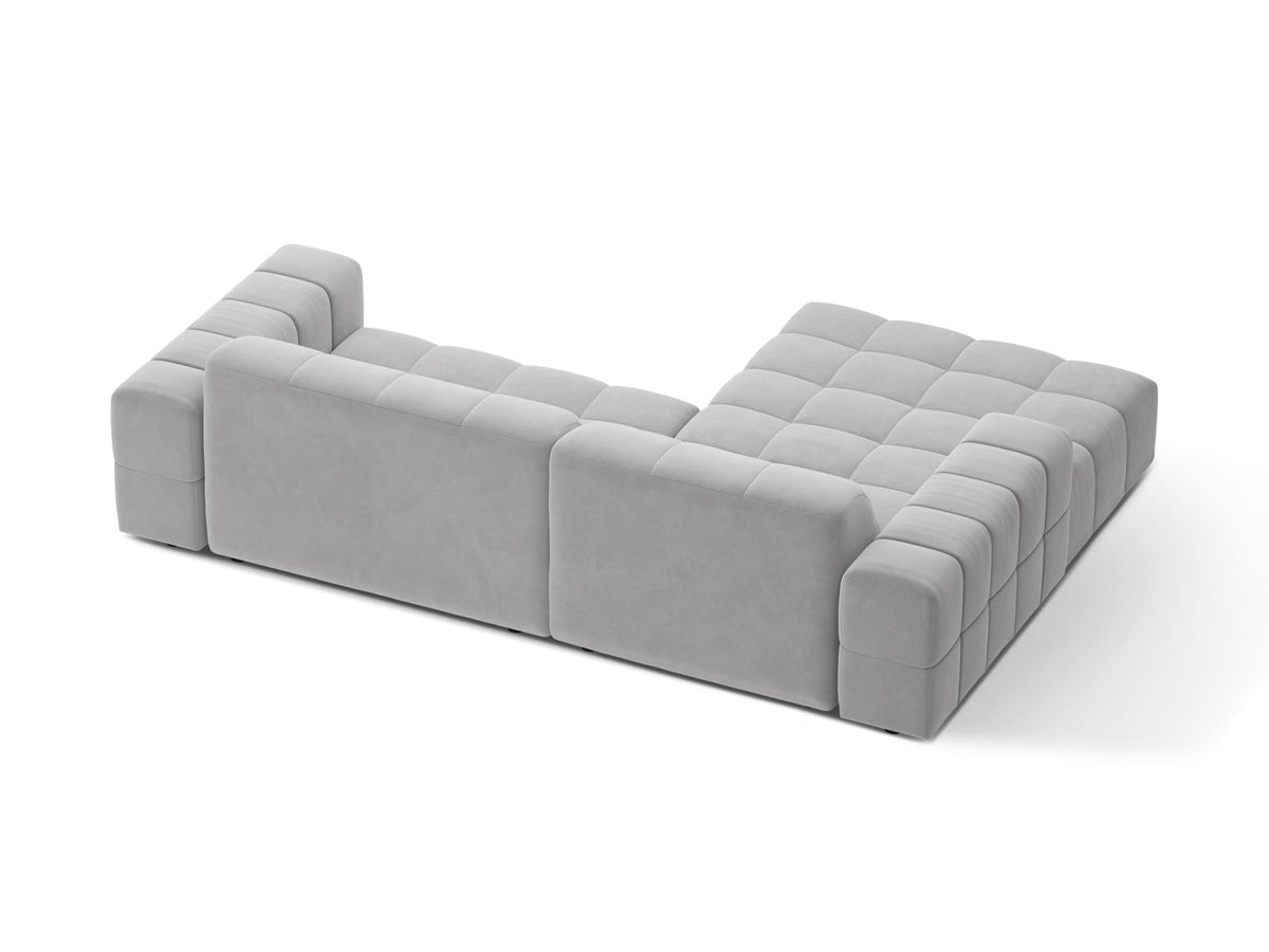 Ecksofa links Chicago in dunkelgrünem Samtstoff mit schwarzen Kunststoffbeinen, Massivholzrahmen und markanter Récamiere-Form.