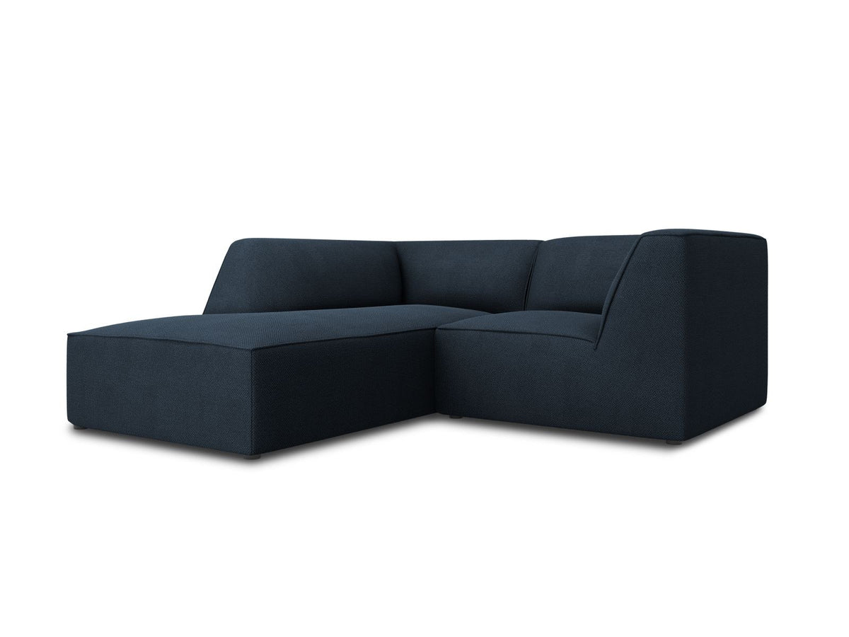Modulares Ecksofa Siena mit gelbem Ottawa-Stoffbezug, schwarzen Kunststoffbeinen und Récamiere, Ansicht von vorne im Wohnraum.