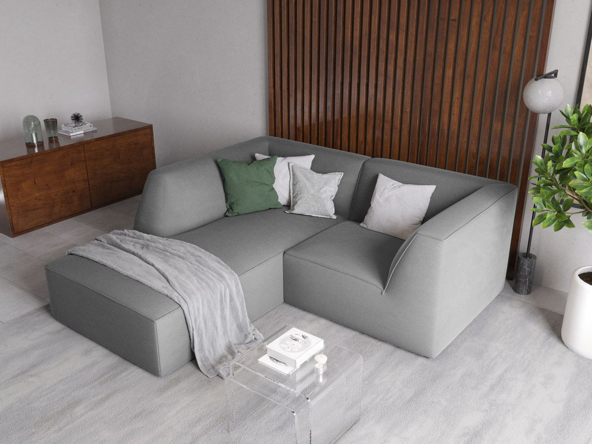 Modulares Ecksofa in Beige-Samt mit Récamiere links, Massivholzrahmen, schwarzen Kunststoffbeinen und weicher Samtpolsterung.