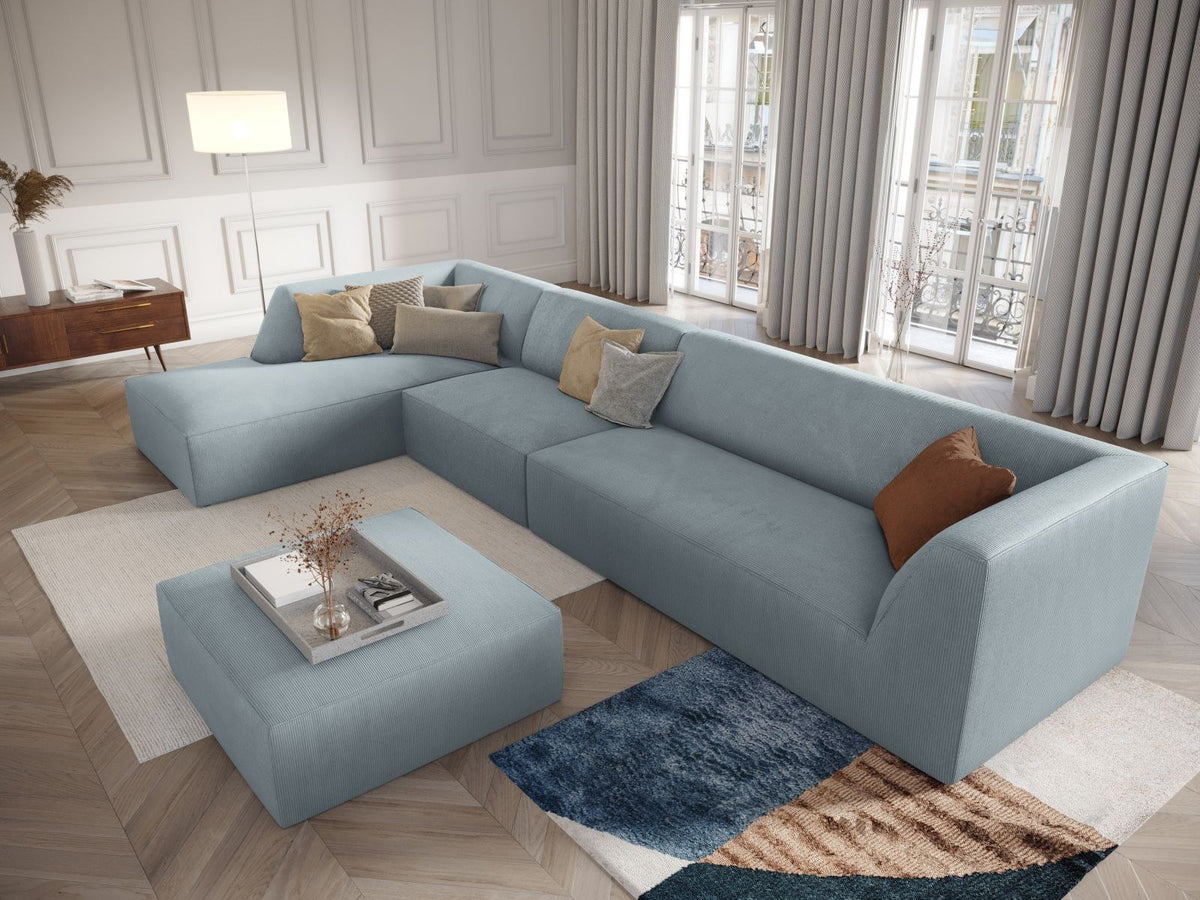Runder Pouf mit hellblauem Cordstoff-Bezug, schwarzen Kunststoffbeinen und Massivholzrahmen, Modell Siena von Cosmopolitan Design.