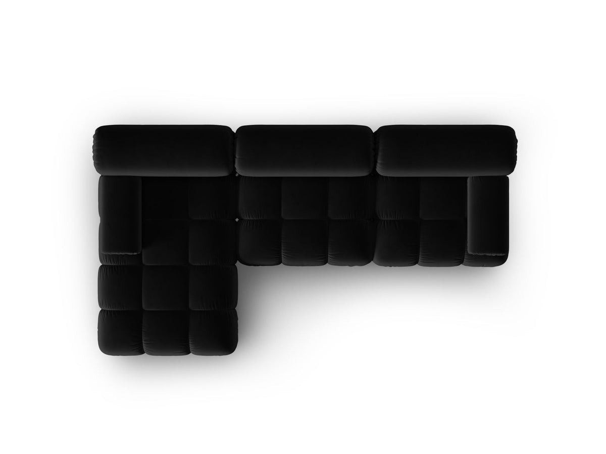 Modulares Ecksofa mit rosa Samtstoff, schwarzen Kunststoffbeinen und gepolsterter Récamiere, Ansicht von vorne links.