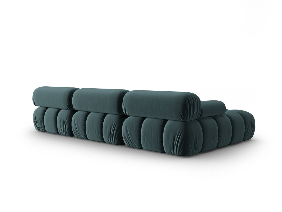 Modulares Ecksofa mit rosa Samtstoff, schwarzen Kunststoffbeinen und gepolsterter Récamiere, Ansicht von vorne links.