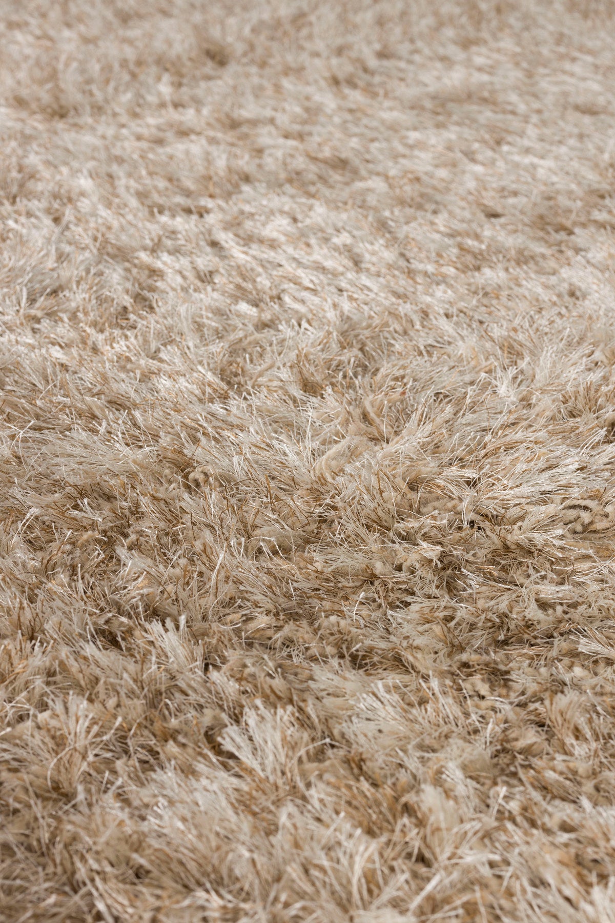 Teppich Hairy 160x230 in Beige präsentiert im Onlineshop von KAQTU Design AG. Teppich ist von Dutchbone