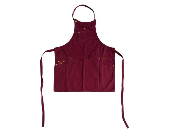 Kochschürze in Aubergine und Braun aus Canvas mit Rundhalsausschnitt, schmalen Seitenteilen, fünf Taschen und Knöpfen zur Anpassung.