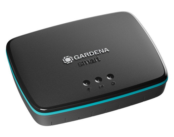 Schwarzes GARDENA Verbindungsgerät Smart Gateway mit LAN-Kabel und Netzteil, kompaktes Kunststoffgehäuse für die smarte Gartenvernetzung.