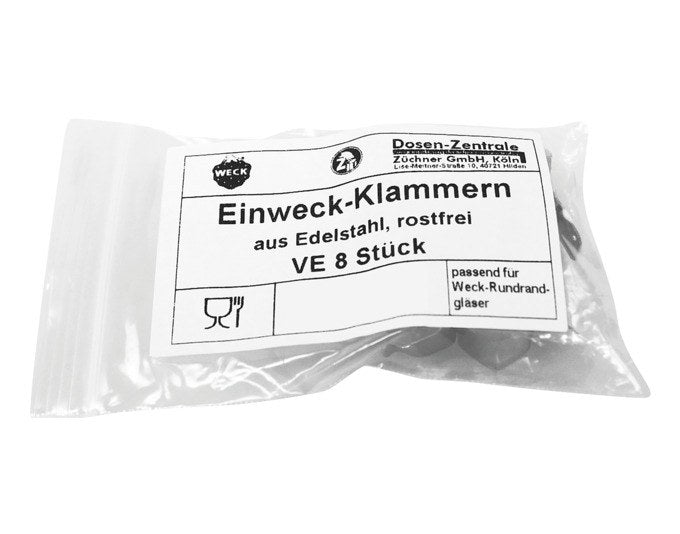 Acht glänzende Einweck-Klammern aus Chromstahl, flach und länglich geformt, liegen nebeneinander zur Befestigung von Einmachglas-Deckeln.