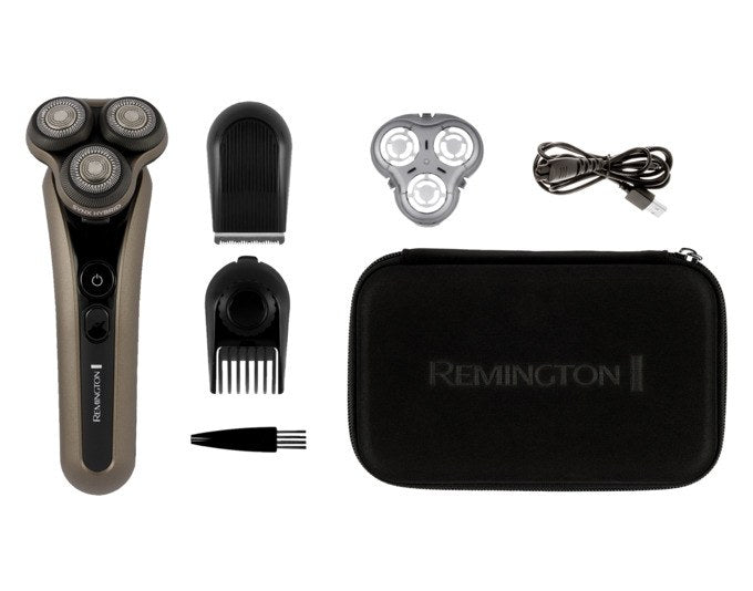 Bronzefarbener REMINGTON Rasierer XR1795 Limitless X9 mit rundem Scherkopf, Click-On Trimmer und Ladekabel auf hellem Hintergrund.