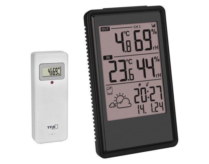 Schwarze TFA Funk-Wetterstation Etna mit Display für Innen- und Aussentemperatur, Luftfeuchtigkeit, Uhrzeit und Wettervorhersage-Symbolen.