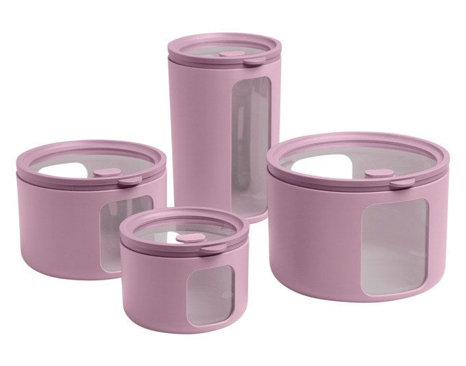 Vier stapelbare Vorratsdosen der Serie Tondo von BLIMPLUS in Mauve, unterschiedliche Grössen mit transparenten Deckeln und seitlichen Fenstern.