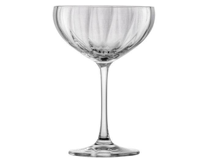 Vier Sektschalen Blossom von SCHOTT ZWIESEL aus transparentem Tritan Kristallglas mit weich geöffneter Coupette-Form und strukturierter Oberfläche.