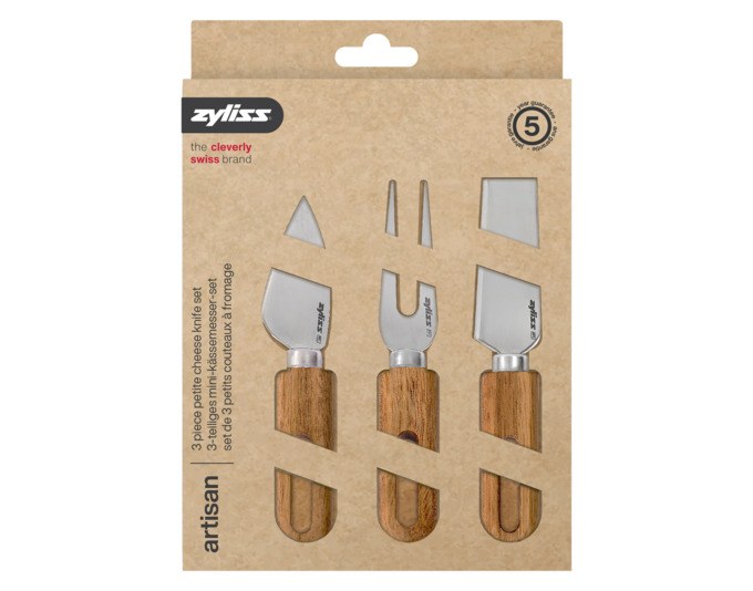ZYLISS Käsemesserset Artisan Akazie 3-teilig: Hartkäsemesser, Käsebeil und Käsegabel aus Akazienholz in Natur und Braun auf hellem Hintergrund.