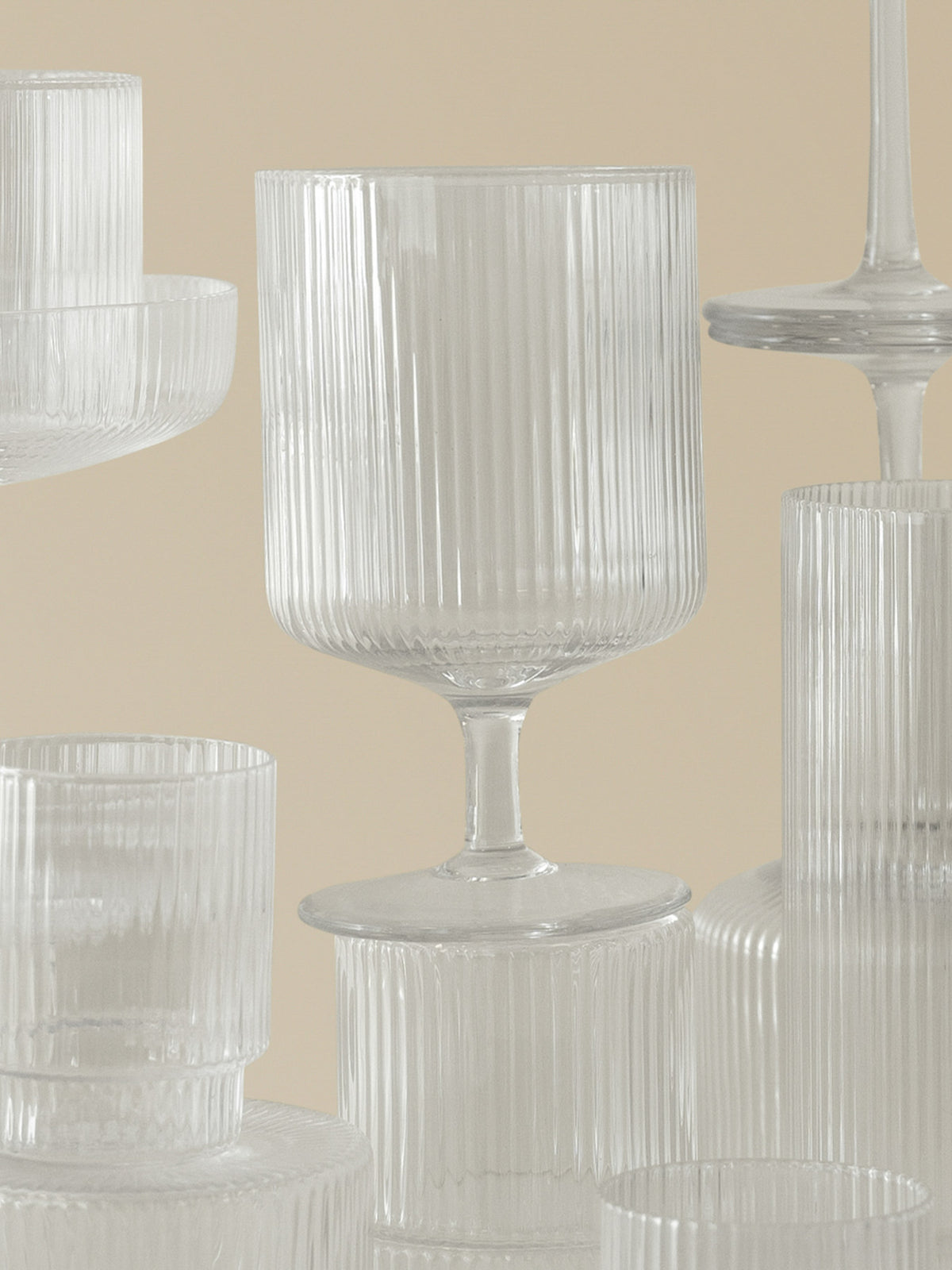 Ripple Gläser klein 4er Set in Klar präsentiert im Onlineshop von KAQTU Design AG. Trinkgläser ist von Ferm Living