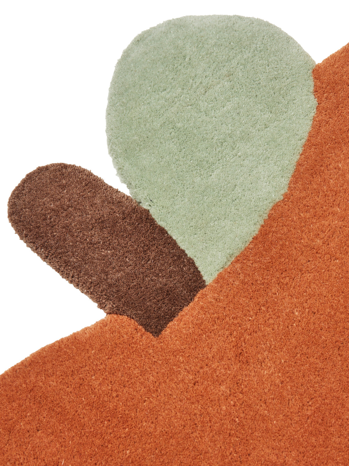Apple Tufted Rug in Brown Clay präsentiert im Onlineshop von KAQTU Design AG. Teppich ist von Ferm Living
