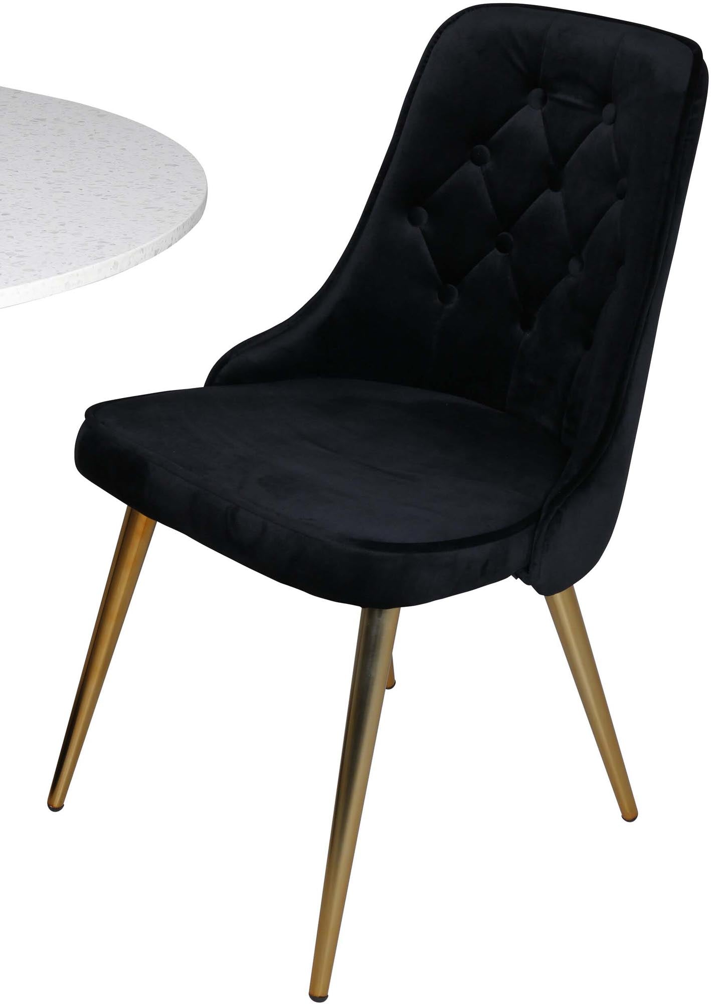 Elegantes Esszimmerset mit stilvollem Samtbezug und robustem Tisch für gesellige Momente und zeitlose Einrichtung.