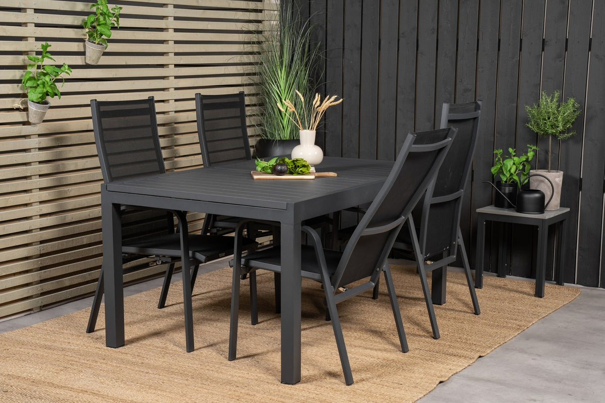 Schwarzes Aluminium-Gartentischset Marbella mit ausziehbarer Tischplatte und acht pulverbeschichteten Copacabana-Stühlen im Outdoor-Bereich
