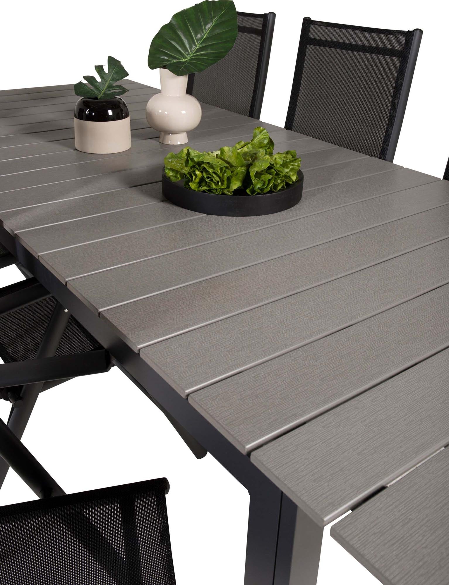 Stilvolles Levels Outdoor-Tischset von Venture Home: Platz für 6, wetterfeste Materialien, ideal für gesellige Momente im Freien.
