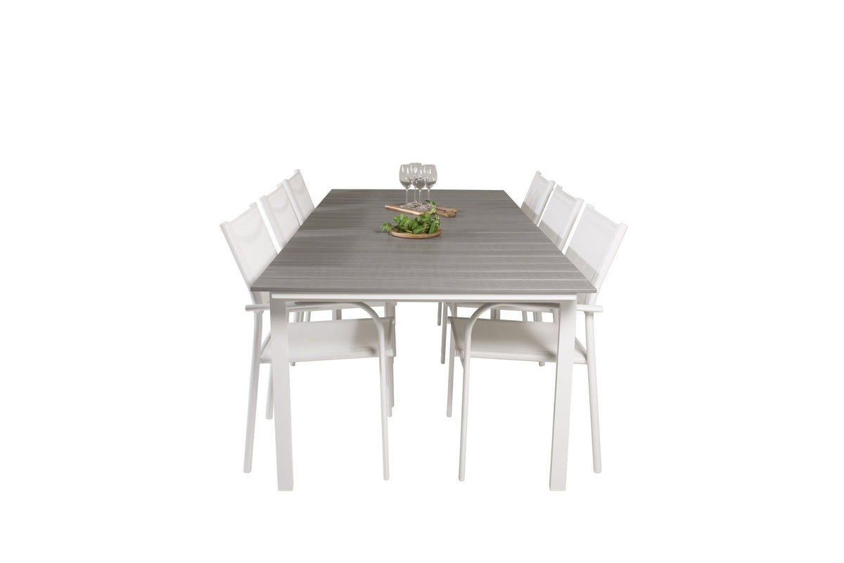 Weisses Gartentischset Levels & Santorini von Venture Home: rechteckiger Esstisch aus Aluminium und Aintwood mit stapelbaren Stühlen in Weiss.