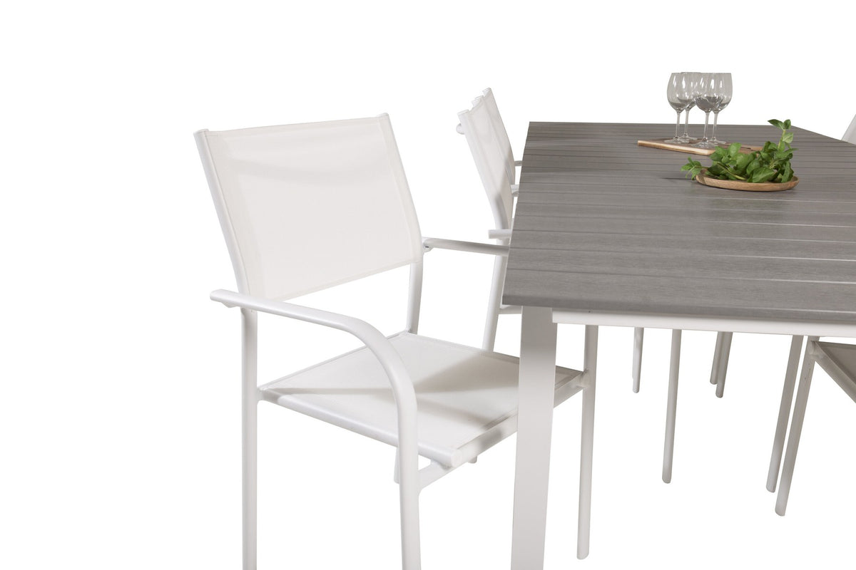 Weisses Gartentischset Levels & Santorini von Venture Home: rechteckiger Esstisch aus Aluminium und Aintwood mit stapelbaren Stühlen in Weiss.