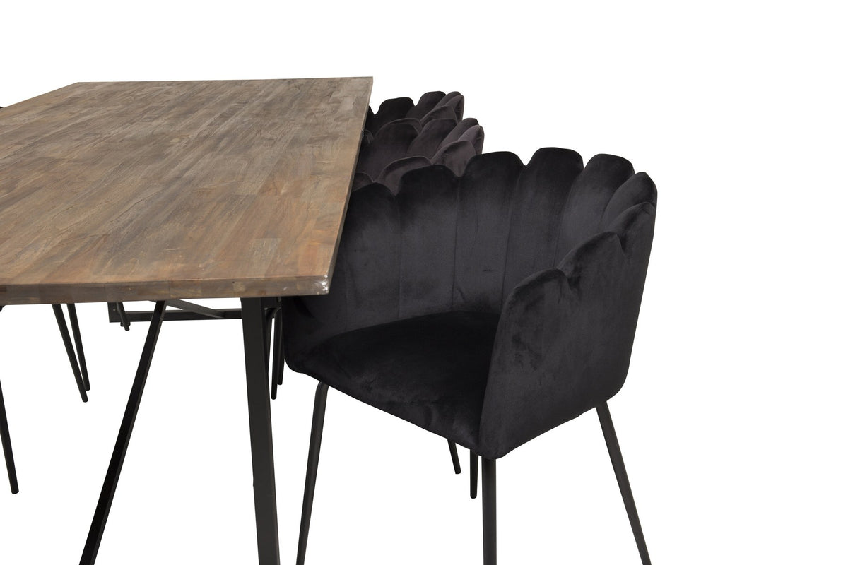 Padang Esstisch mit Teak-Platte und Stahlbeinen, kombiniert mit schwarzen Limhamn Stühlen aus Stahl und Polyester-Samt-Bezug.