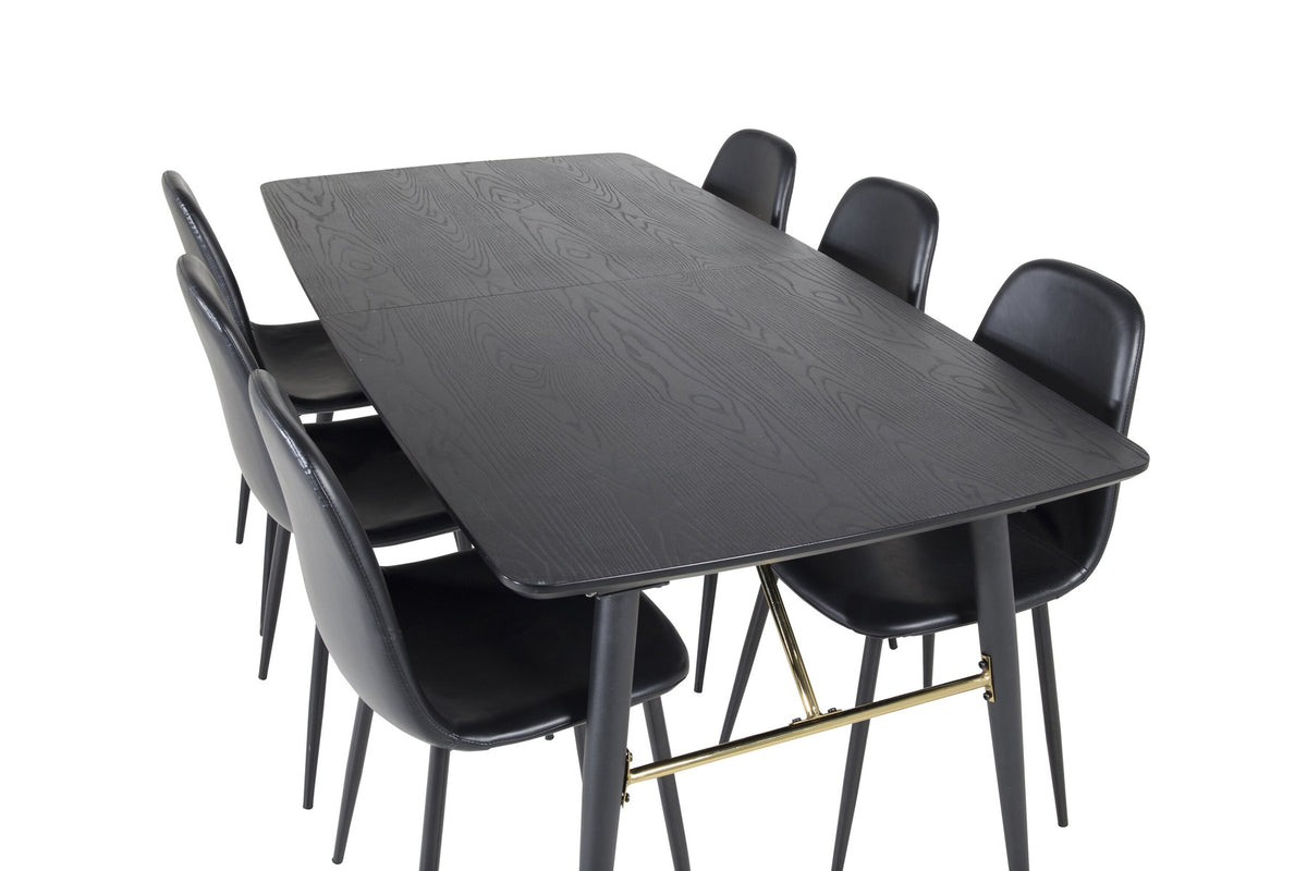 Rechteckiger Esstisch mit schwarzer MDF-Tischplatte und Stahlgestell, dazu zwei schwarze Esszimmerstühle mit gepolsterter Sitzfläche.