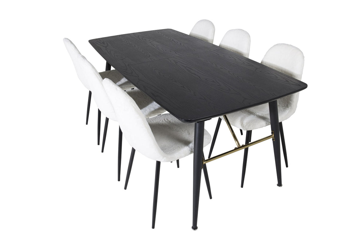 Esszimmerset mit ausziehbarem Esstisch aus MDF mit schwarzer Platte und Stahlbeinen, dazu zwei weisse Stühle aus MDF und Stahl.