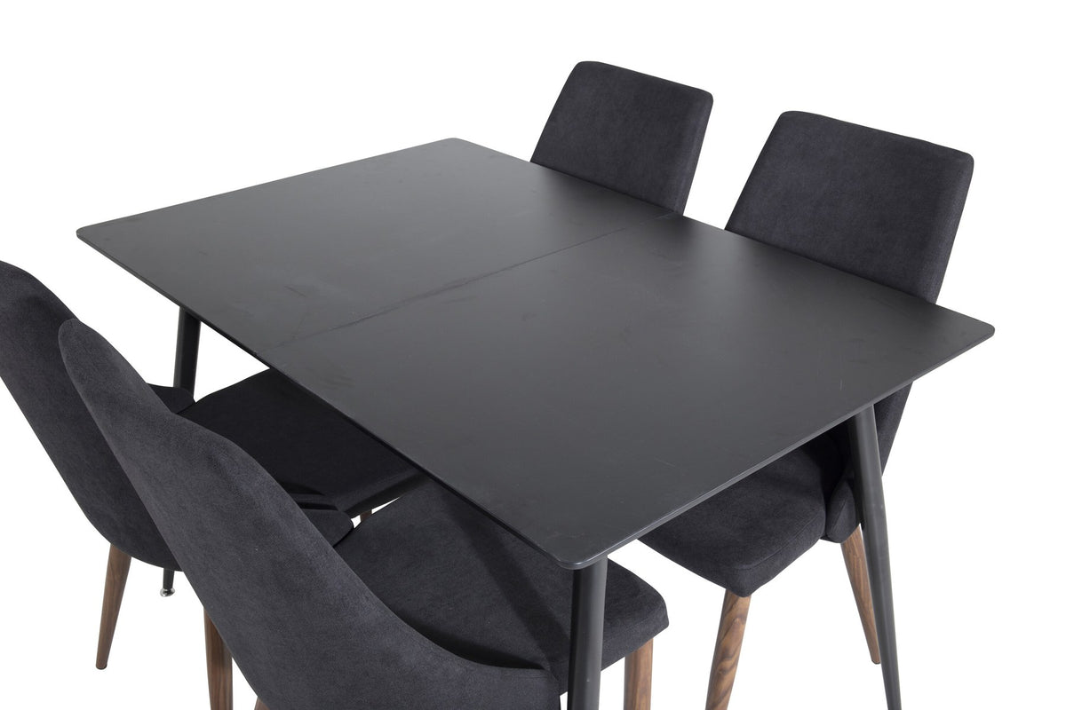 Rechteckiger schwarzer Esstisch aus MDF und Stahl mit zwei gepolsterten Stühlen mit Walnussbeinen und schwarzem Stoffbezug im Esszimmerset.