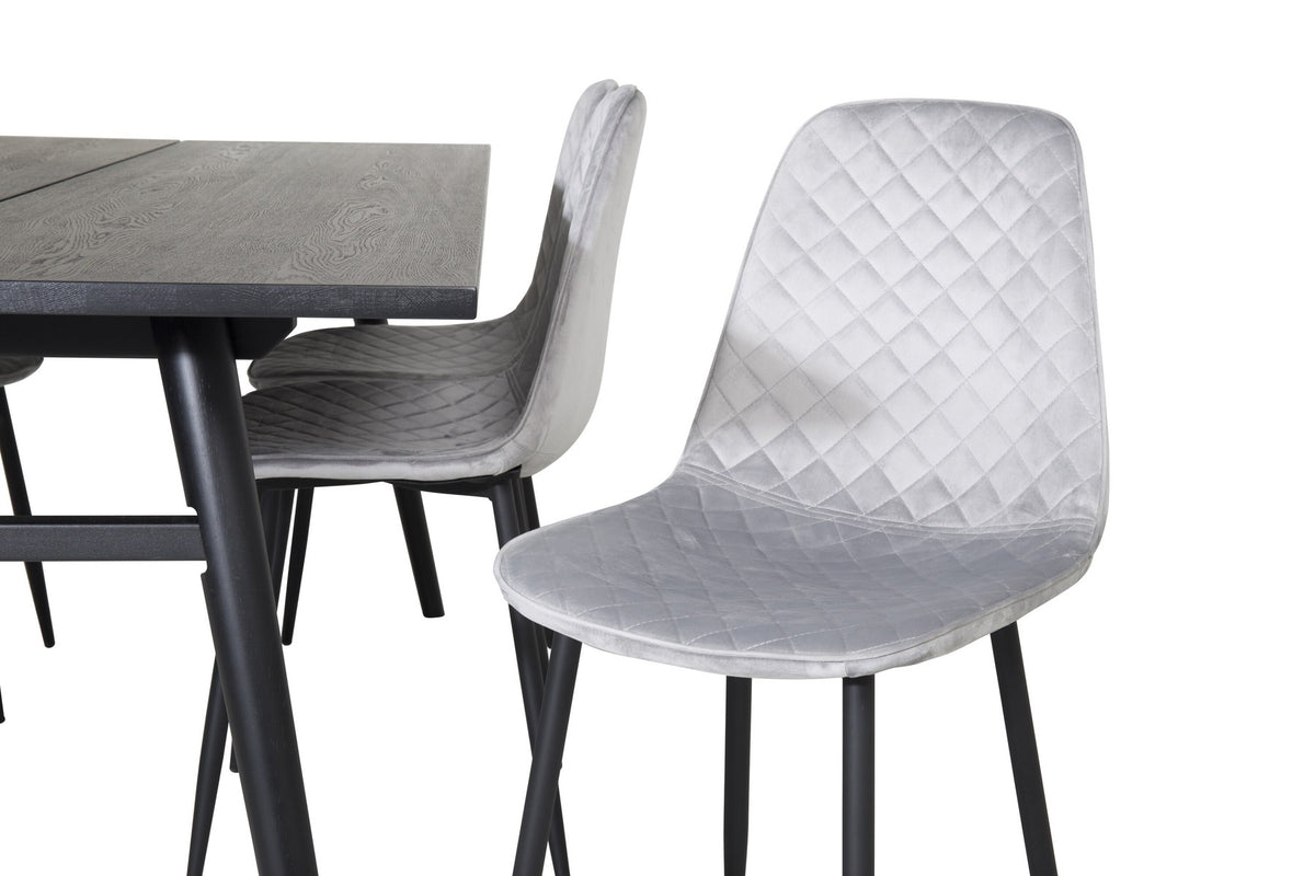 Esszimmerset Sleek & Polar: ausziehbarer Esstisch mit schwarzer Eichenplatte und Stahlbeinen, sechs Stühle mit schwarzem Samtbezug und Stahlgestell.