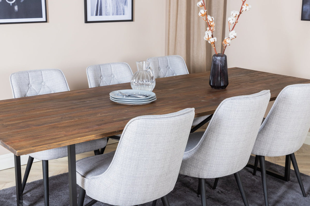 Esszimmerset Padang mit Teak-Esstisch und Velvet Deluxe Stühlen in Blau, Stahlgestell schwarz pulverbeschichtet, Polyesterbezug.