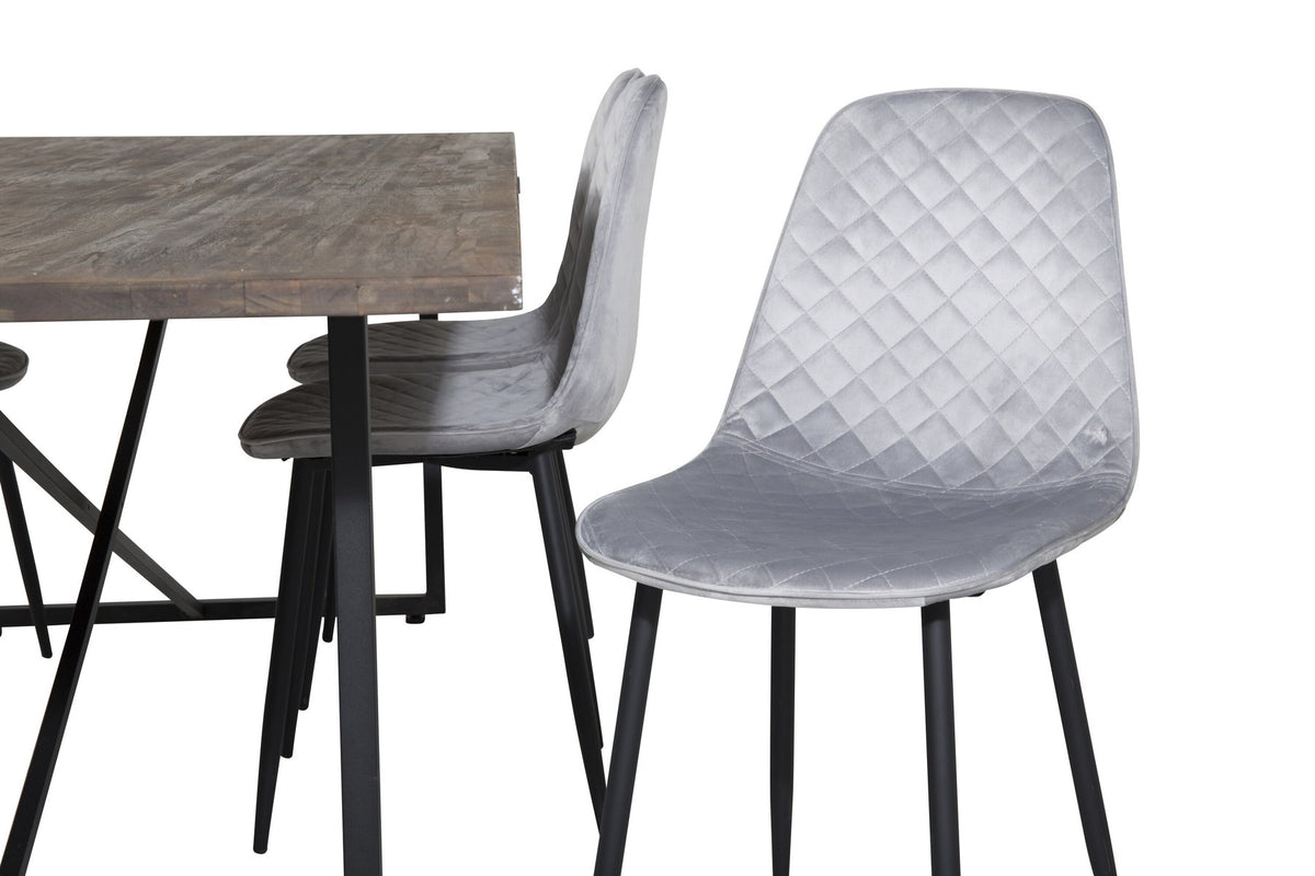 Esstisch mit Teak-Tischplatte in Natur und Stahlgestell, dazu Stühle mit schwarzem Stahlrahmen und grauem Polyester-Samt-Bezug.